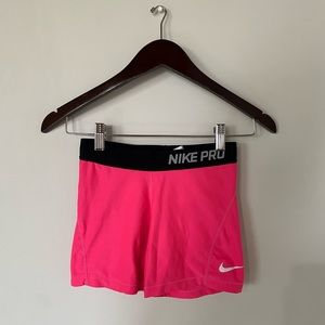 Neon pink Nike pros